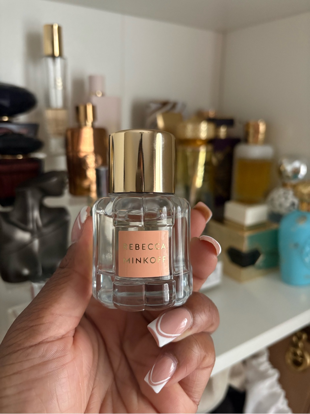 Rebecca Minkoff Clear Mini Perfume Bottle With Gold Cap And Peach Label